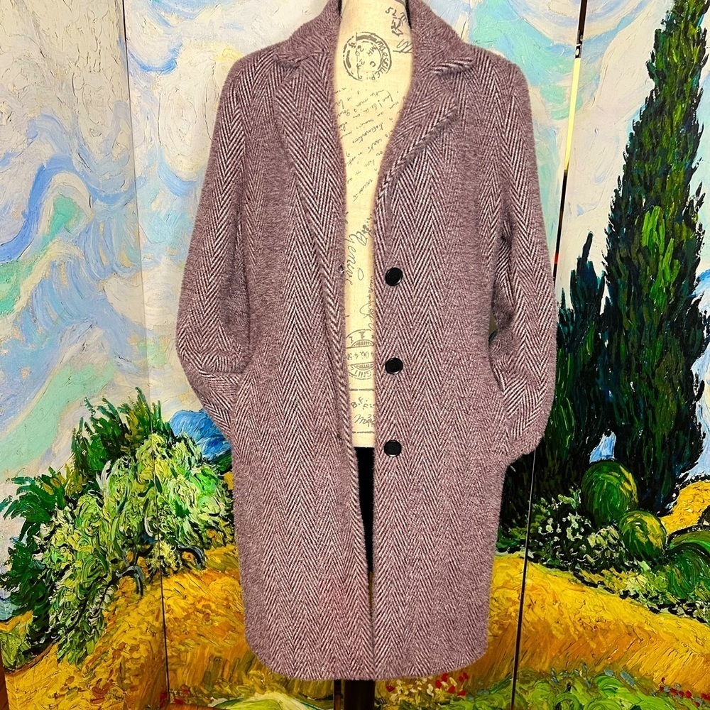 DKNY size medium, full length, purple and white, chevron pattern coat.